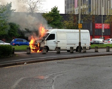 Van Fire Causes Delays at Rush Hour
