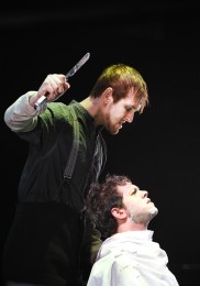 Sweeney Todd (Jak Skelly) with his first opportunity at Judge Turpin (Christopher McCann) - (Pamela Raith Photography)