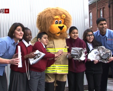 Schoolchildren learn about fire safety through Lion Mascot
