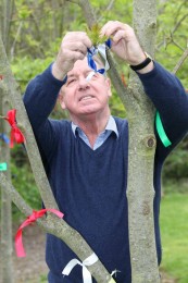 Alan Birchenall ties a ribbon at the 2012 event. credit LOROS