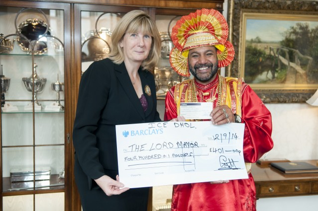 King G Mall presenting a cheque of £401 to the Lord Mayor's Deputy Councillor Anita Ward.  Credit. King G Mall