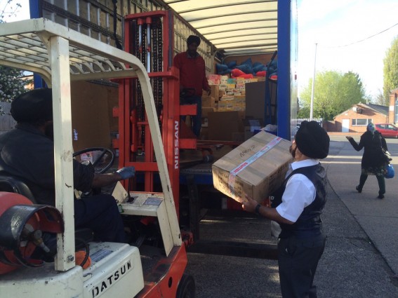 Loading the truck with much needed items to help the Nepal Earthquake victims.  Credit. Vic Sethi