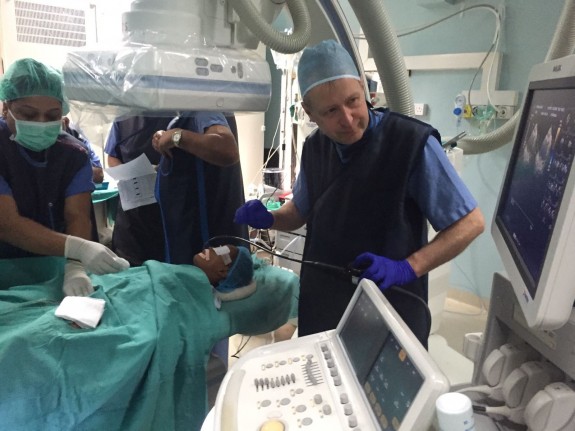 Dr Phillip Arnold performs treatment Photo Credit: Pukaar News