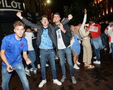 Leicester, Leicestershire, UK 7th July 2021. UK News. Football fans celebrate in Leicester City Centre after England beat Denmark to reach the final of Euro 2020. Alex Hannam